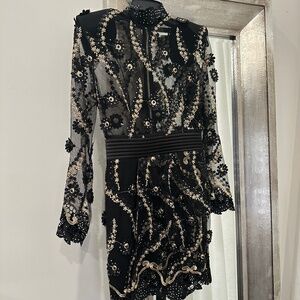 Raise Your Hand Mini Dress in Black Zhivago